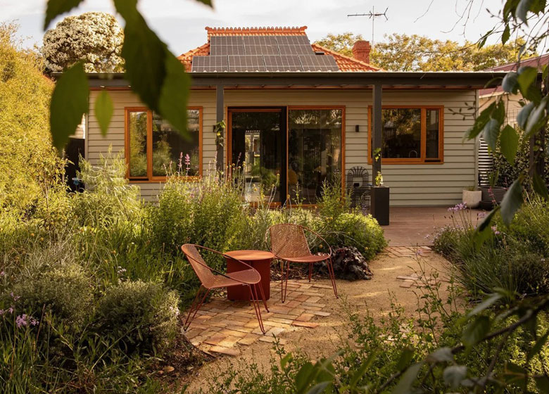 house with naturalistic garden